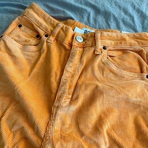 orange flare jeans